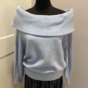 Off the shoulder sweater.